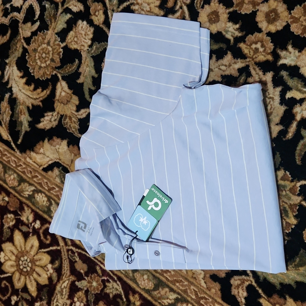 Foot Joy Men's Polo. Fits like and XL.